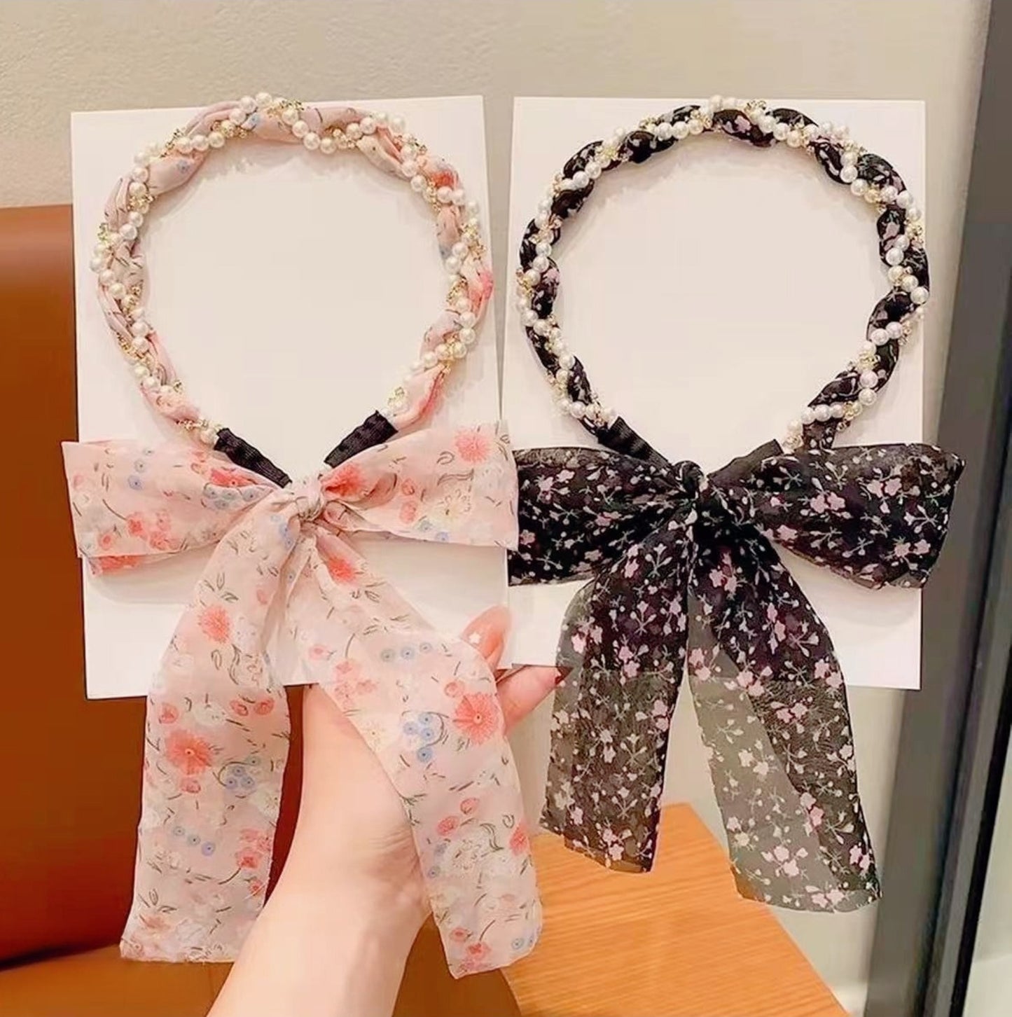 Pearl braided headband with floral chiffon bow, available in pink and black for women
