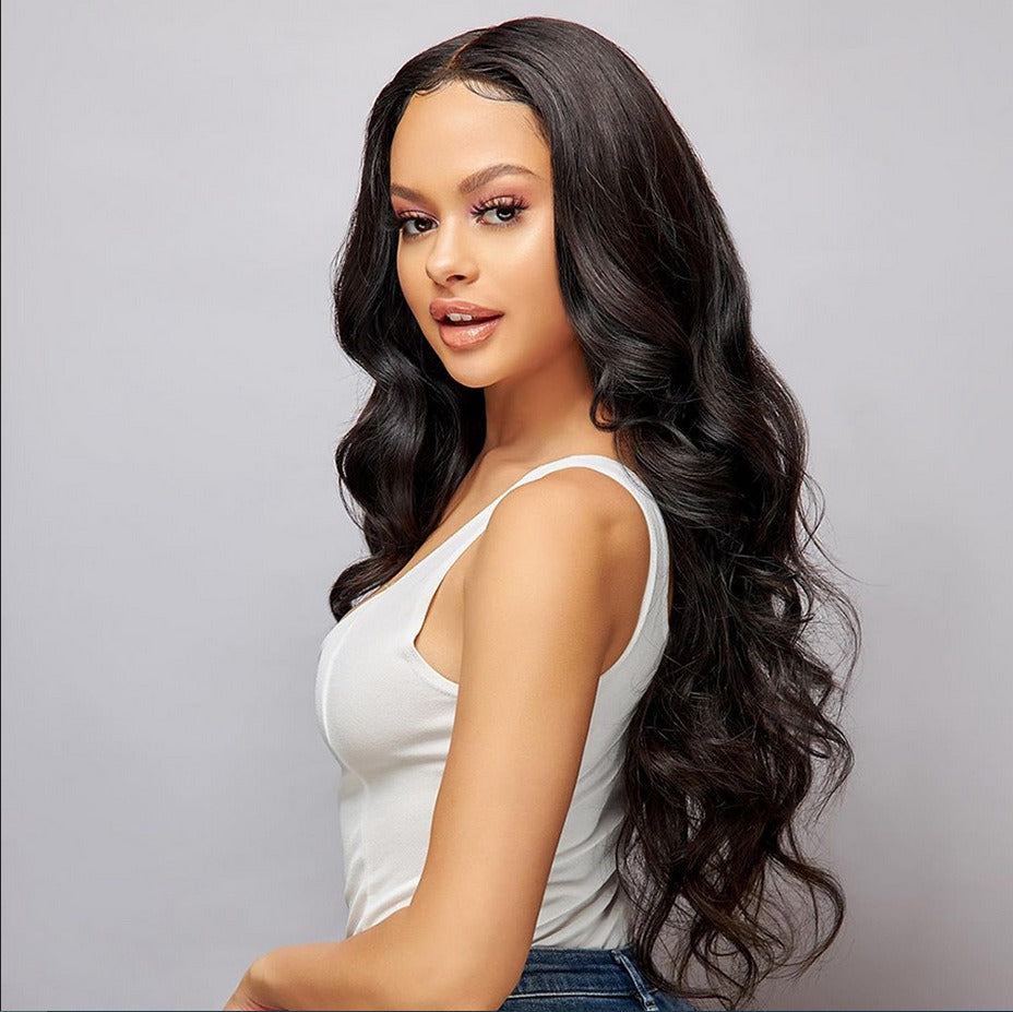 Close-up of 10A body wave hair bundles, highlighting the soft texture and thick ends.