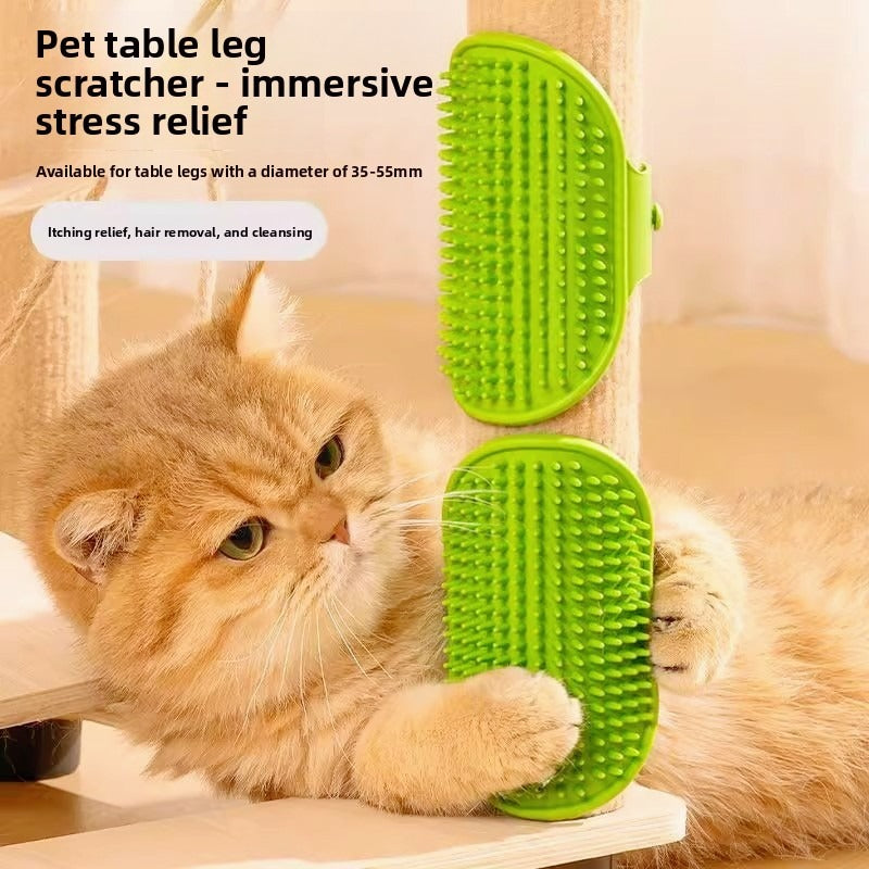Green Pet Table Leg Scratcher with soft silicone bristles mounted on a wooden table leg, with a ginger cat using it for grooming and stress relief