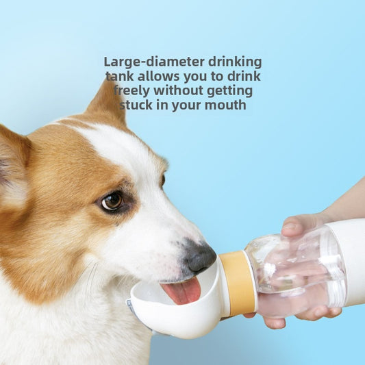 Corgi drinking from a white portable pet water bottle with a large-diameter trough, with text highlighting mess-free drinking.