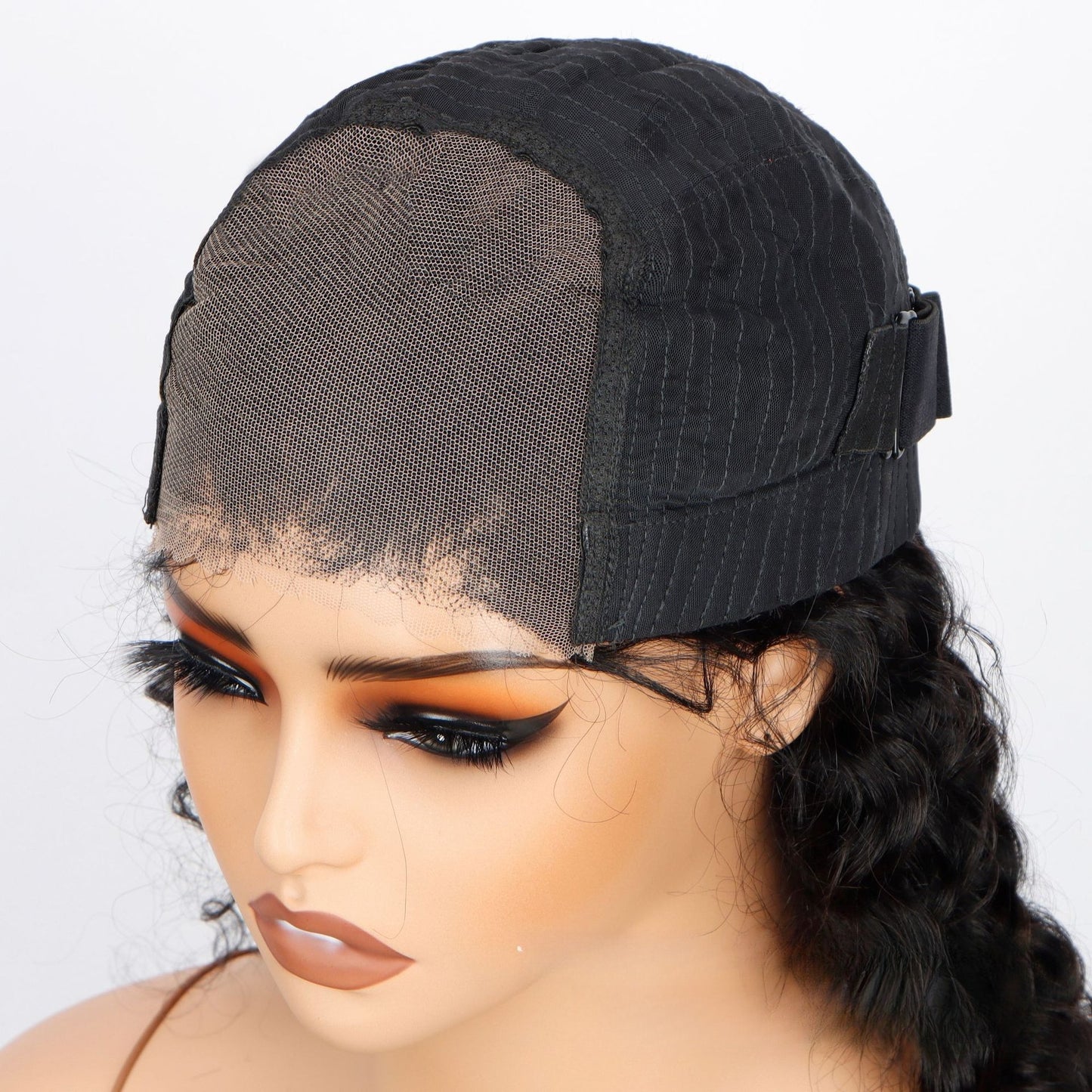 Angled front view of 5*5 HD glueless wig: showing HD lace closure and deep wave pattern