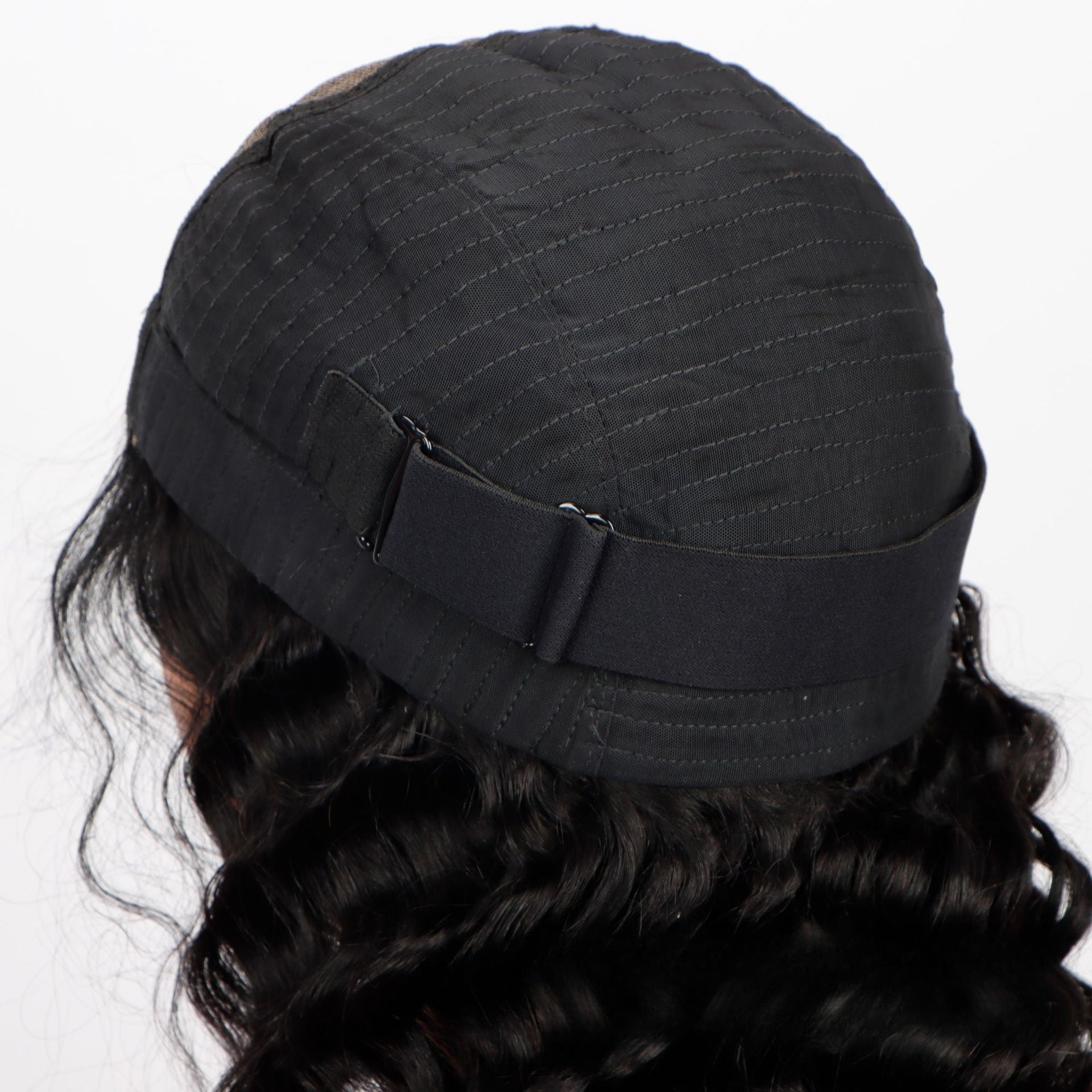 Back/side view of 5*5 HD glueless wig: displaying the adjustable strap and inner cap design